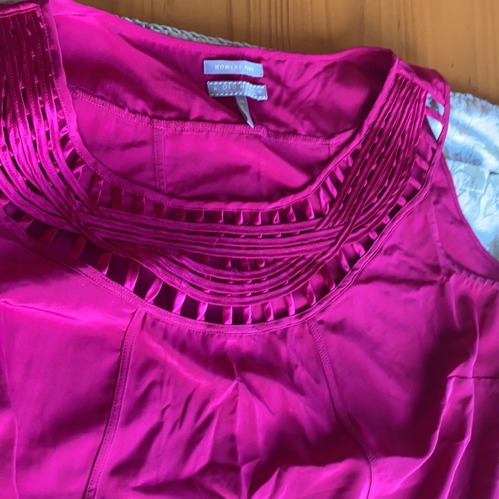 Bright pink blouse with cut outs detail